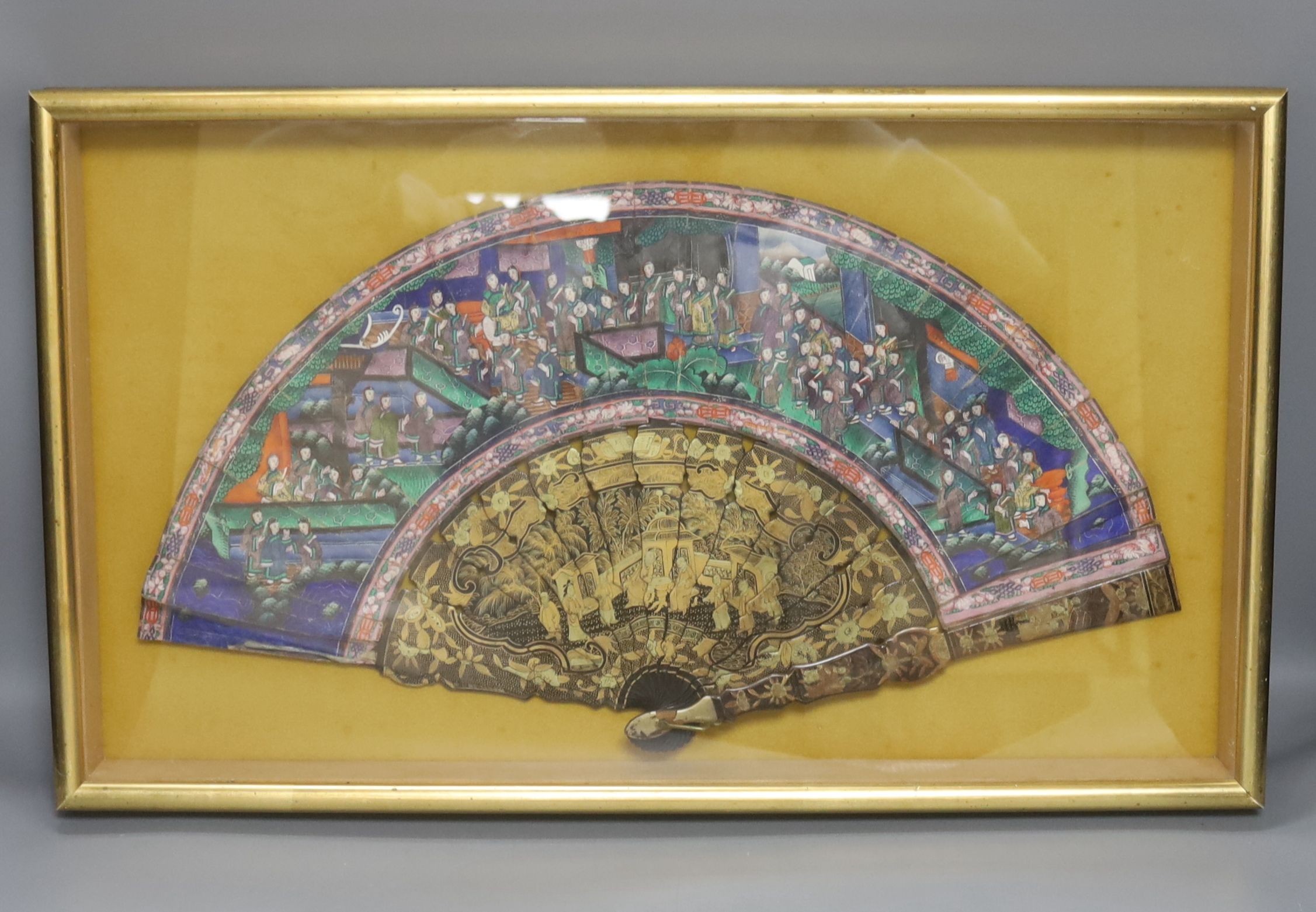 A cased 19th century Chinese Canton export gilt decorated lacquer fan, with painted paper leaf, case 35 x 59 cm